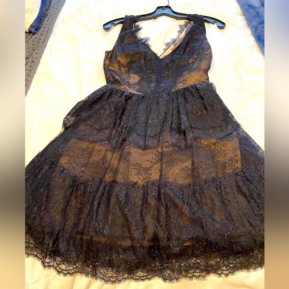 Beautiful BCBG MaxAzria Black lace mini dress in XS.